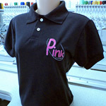 Polo baby look preta com logotipo bordado